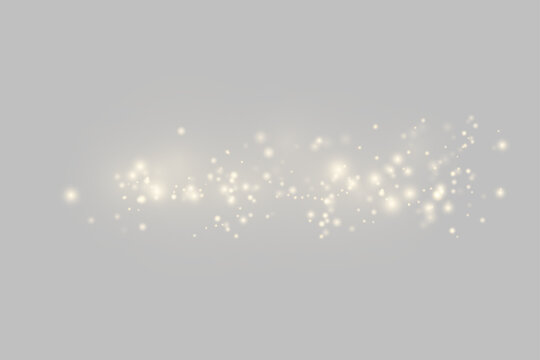 Scattered soft golden light particles on a transparent background with subtle glowing effect on transparent background
