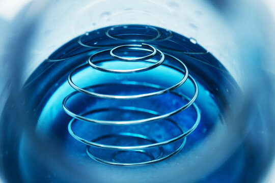Creatine Monohydrate Dissolving in Water &ndash; Abstract Sports Nutrition Concept