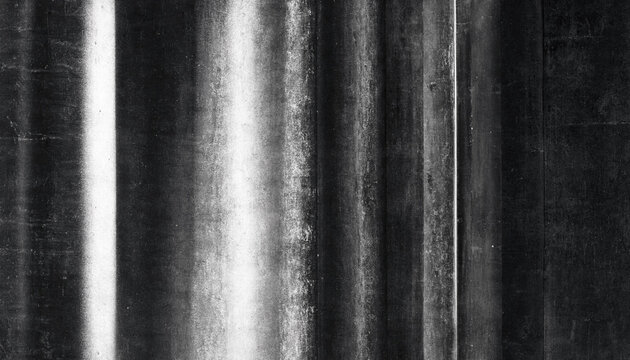 Abstract black and white textured surface showcasing parallel vertical lines with varying light and shadow creating a grunge distressed effect for backgrounds