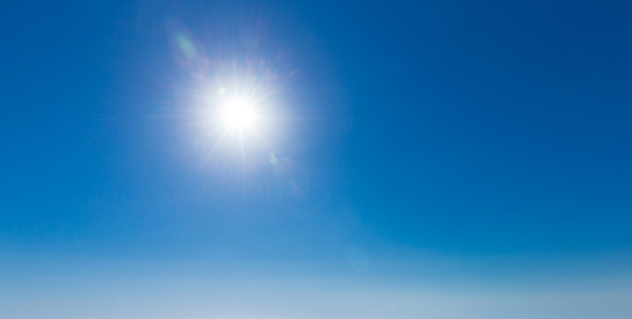 blue sky background with tiny clouds