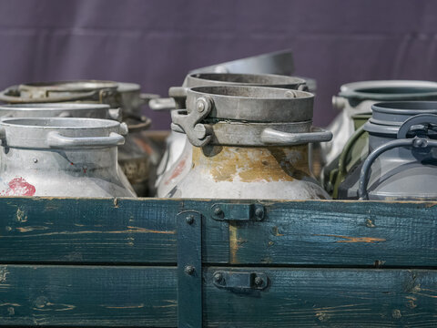 Detail of aluminum container lids on a truck bed.