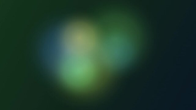 Abstract soft bokeh background, with floating glowing, orbs in teal, and green tones