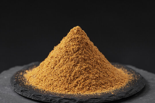 indian garam masala mix on a black slate stone tray