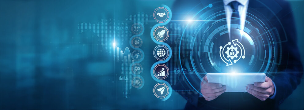 Businessman using tablet analyzing Change Management and business data, monitoring organizational progress, improving processes, supporting workforce adaptation and optimizing operations