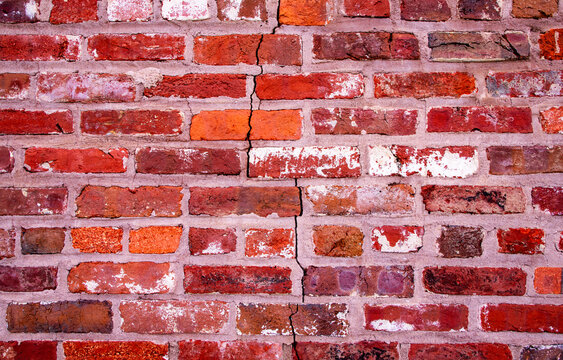 Red bricks wall pattern background. Old bricks brickwall surface texture. Rustic bricks masonry wall structure. Grunge bricks patterned wall.