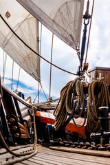 Sailing ship deck with coiled ropes and anchor chain © Georg