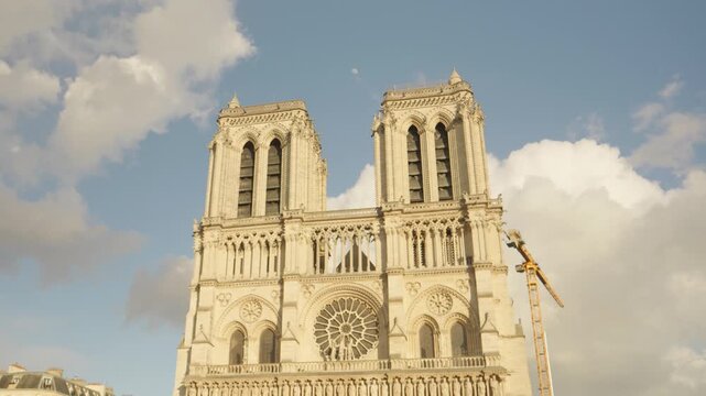 Historic Facade and Twin Towers of Notre-Dame Cathedral in Paris, France