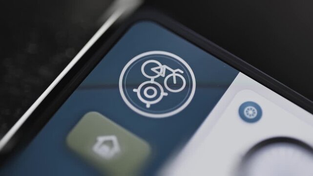 Circular bicycle and gear emblem marks dashboard corner