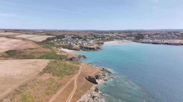 Seven Souls Rock and Pentire Point and Bay over Padstow Bay from a drone, Polzeath, Cornwall, England, Summer 2026
