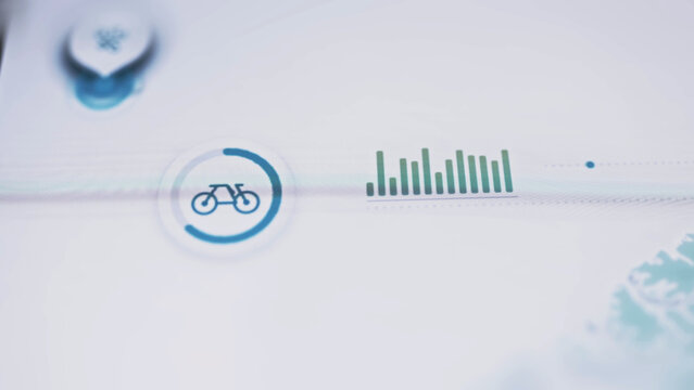 Blue bicycle gauge beside green bar chart