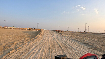 POV Shot from Quad Bike Along Sandy Desert Race Track in Qatar Clear Daylight © Kaitlind