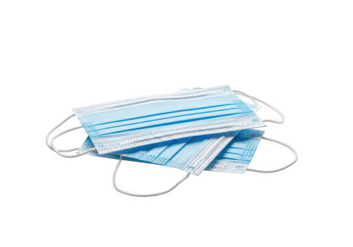 Stack of blue disposable surgical face masks isolated on transparent background