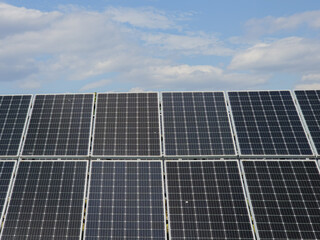 Modern Photovoltaic Solar Panels Facing Blue Sky © Ольга Кібукевич