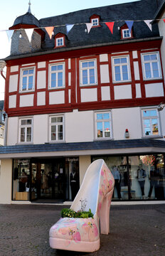 Oversized high heel sculpture in the historic center of Montabaur, Germany