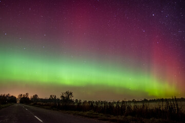 The northern lights above the road © Александра Плискова