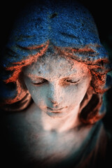 Obraz premium Serene angel with lowered eyes in deep prayer and contemplation, symbolizing humility, faith, inner peace, divine protection and spiritual reflection.