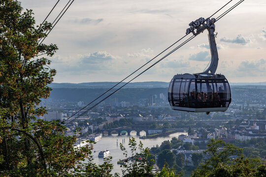 Koblenz Cable Car cabin descending with panoramic view of the river city and bridges below in Germany