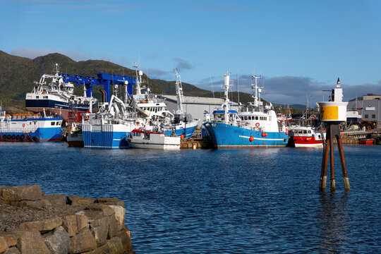 Fishing vessels and shipyard in Ballstad harbor on the Lofoten Islands, Norway
