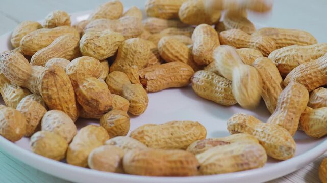 Peanut Shells Blown Away by Air Blast During Sorting Process
