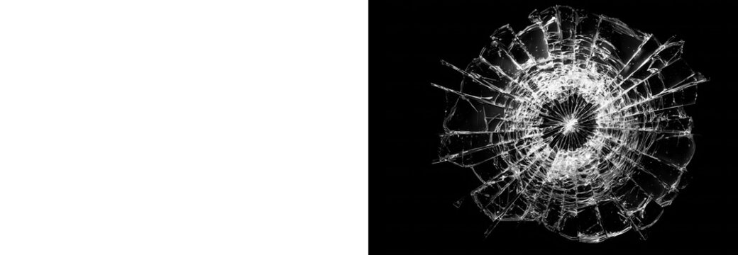 Shattered glass texture with radial cracks isolated on black background