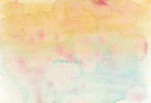 Watercolor background featuring hand painted art faded yellow, blue, pink colors