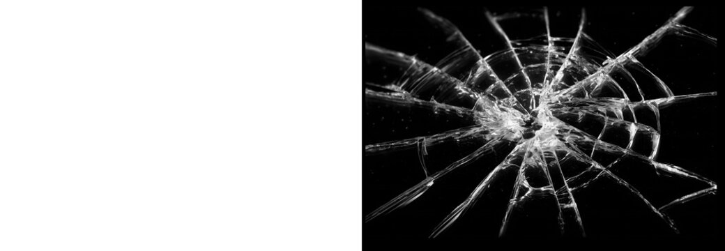 Shattered glass texture with radial cracks isolated on black background