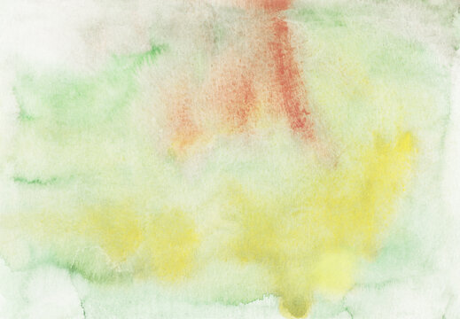 Hand painted watercolor background with stains and soft colors on paper showing abstract art technique