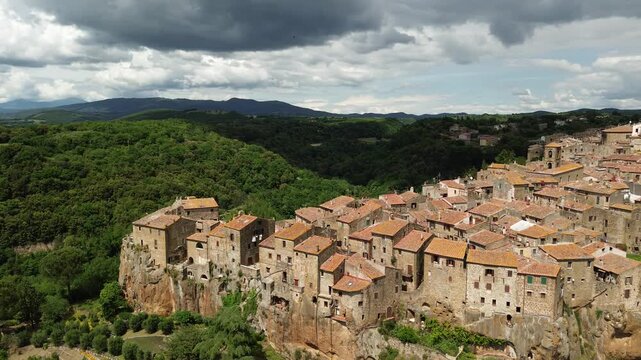 Wide Aerial View of Pitigliano Under Cloudy Skies - Tuscany, Italy
