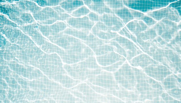 Bright aqua pool water ripples with light grid mosaic bottom