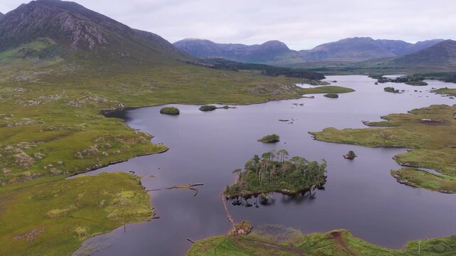 Drone panorama of lake islands below the Twelve Bens, Connemara, Ireland