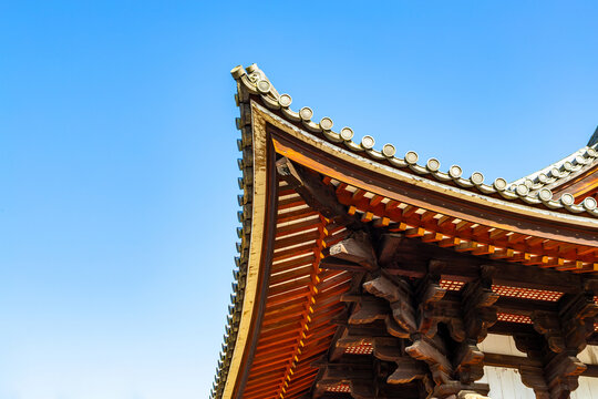 Japanese architecture known as kumimono, a system of blocks and brackets supporting the roof structure. The technique was introduced from China to Japan with Buddhism in the 6th century.