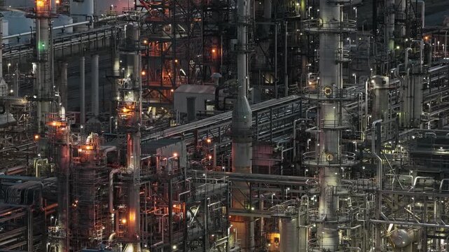 Oil refinery evening night america close up mechanical drone video Denver Colorado 4K