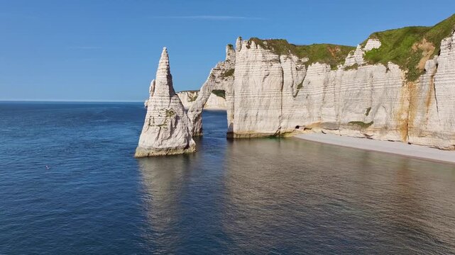 Aerial view, flight through the distinctive Porte d'Aval rock gate in the evening sun, a landmark and natural beauty on the chalk coast near &Eacute;tretat, Alabaster Coast, La C&ocirc;te d'Alb&acirc;tre, chalk clif