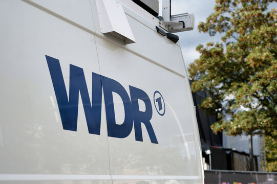 Cologne, Germany September 18 2026: WDR broadcasting van parked near the Cologne Opera House for live media coverage of the grand reopening