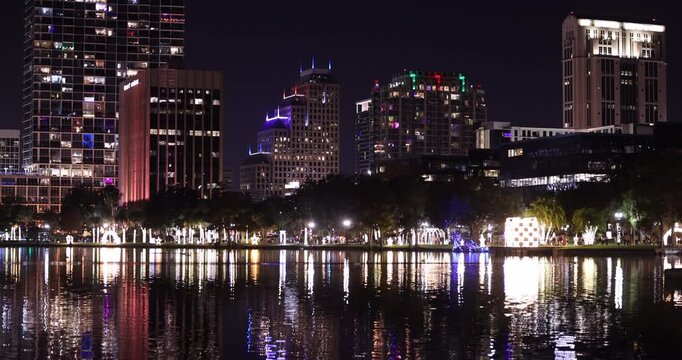 Night time view of the downtown Orlando, Florida, USA, skyline at night during the holiday months.