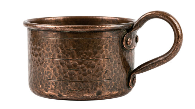 A vintage hammered copper drinking vessel features a rustic textured surface and a sturdy side handle suitable for serving warm beverages while maintaining a traditional aesthetic in your home