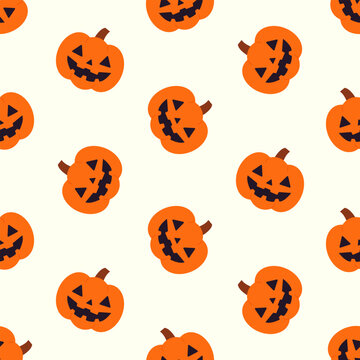 Seamless pattern of orange Halloween jack o lantern pumpkins on white background