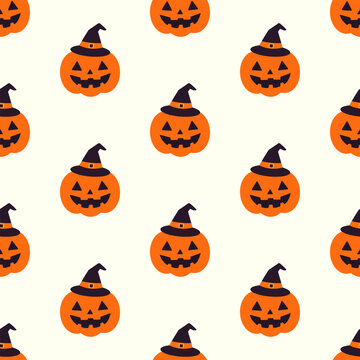 Orange Halloween pumpkins wearing black witch hats on a seamless white background