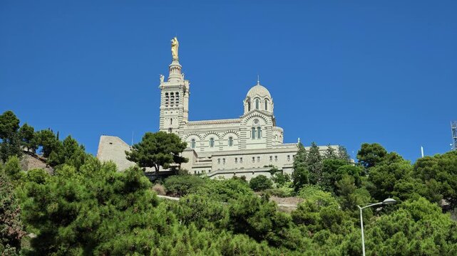 Beautiful view of the Notre Dame de la Garde basilica standing on a hill in Marseille, France