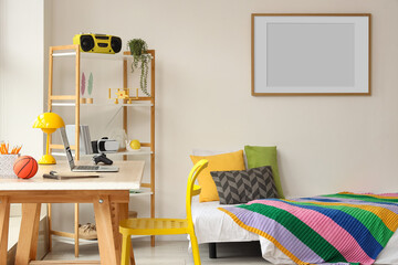 Remote learning and student lifestyle modern bedroom interior with desk laptop and colorful decor for Homeschooling or creative work at Homeschooling © Pixel-Shot