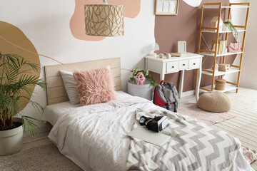 Remote learning and digital education, student bedroom with vr headset and laptop for virtual reality study and online school in a modern home interior © Pixel-Shot