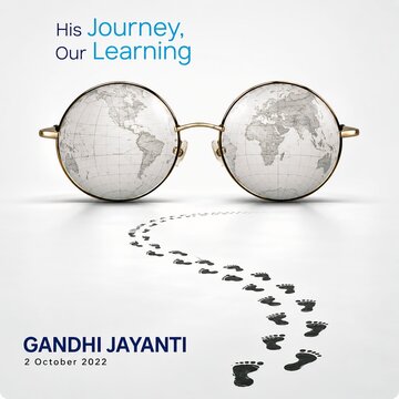 Creative conceptual design of eyeglasses with map lenses and footprints for gandhi jayanti world map mahatma gandhi