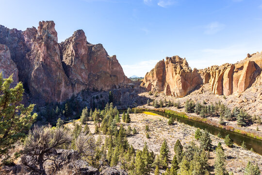 Rocks in the valley of Crooked River illuminated by the afternoon sun. Smith Rock State Park, Oregon