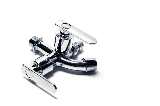 dual-control metallic chrome water tap isolated on a clean white background