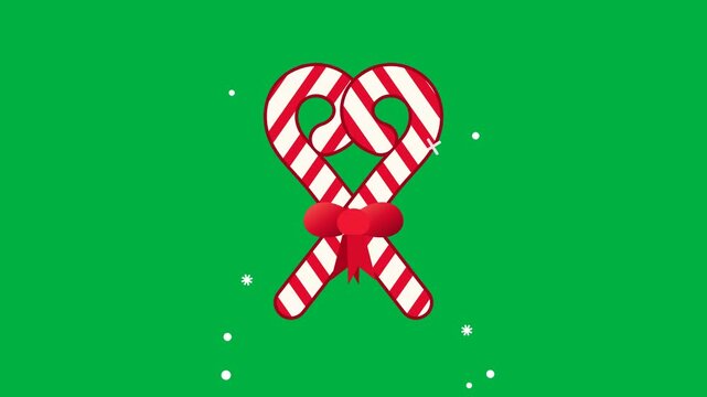 Two peppermint candy canes tied with red ribbon create heart shape in festive Christmas holiday digital animation motion video clip