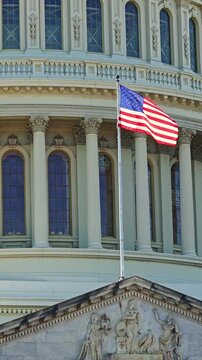 Flag Day concept. Capitol in Washington DC with American flag. Independence Day. US Capitol with American flag. American Capitol government with US flag.