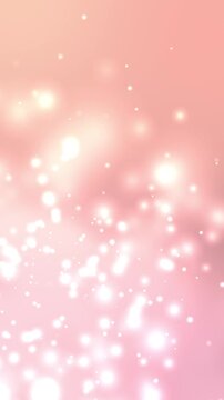 Gentle light particles float in soft pink gradient