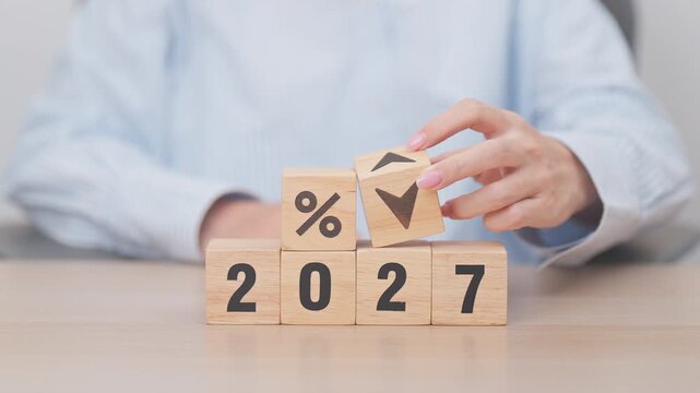 2027 New year with change to UP and Down arrow. Interest rate, GDP, stocks market, financial, deflation and Inflation, mortgage, debt, Loan and Economic Recession