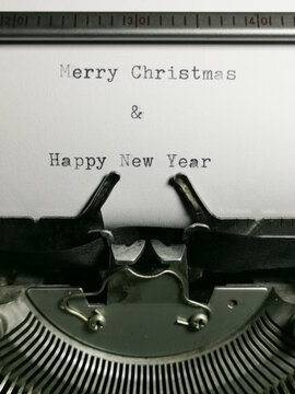 Vintage Typewriter Typing Merry Christmas and Happy New Year Message