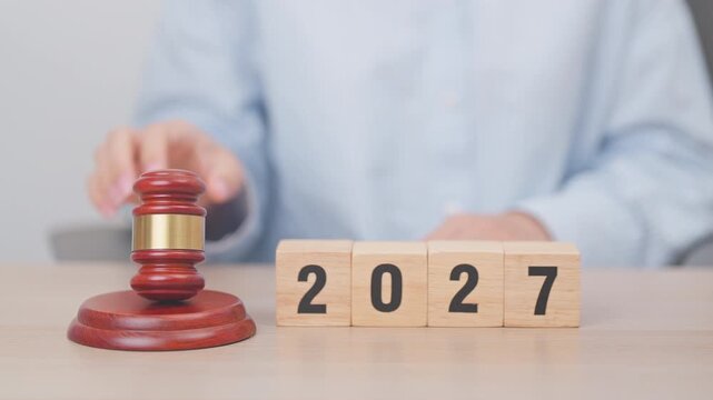 Happy New Year 2027 with judge gavel on table. Law, lawyer, judgment, justice auction and bidding concept